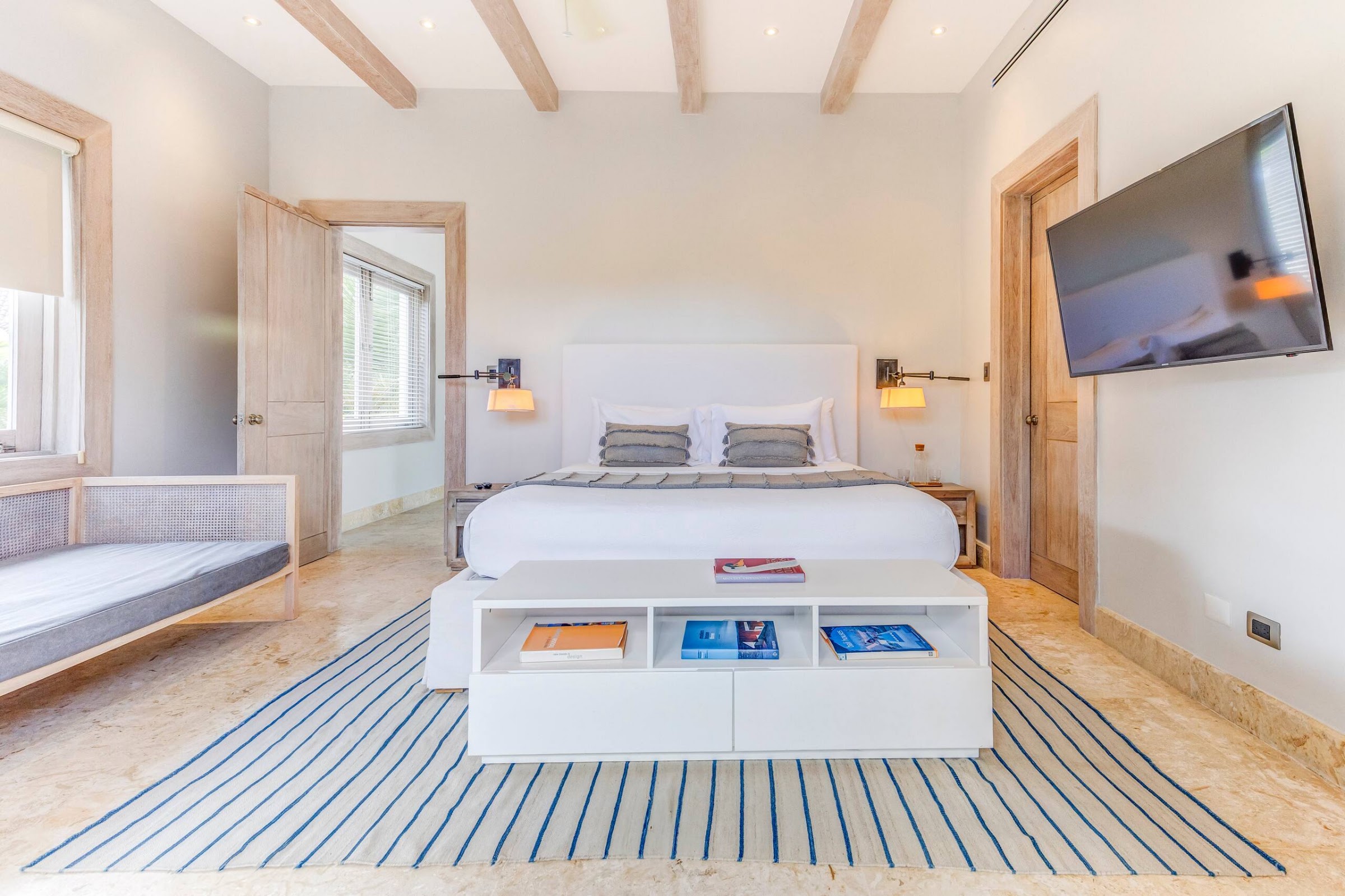 Guest bedroom with stone floors
