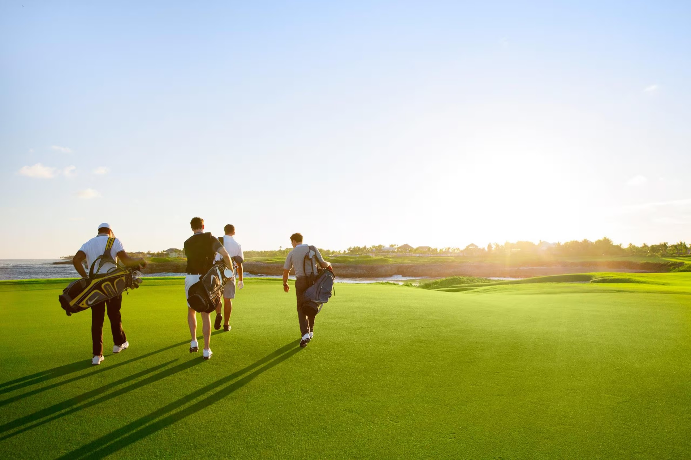 Golfers at sunset on the resort course
